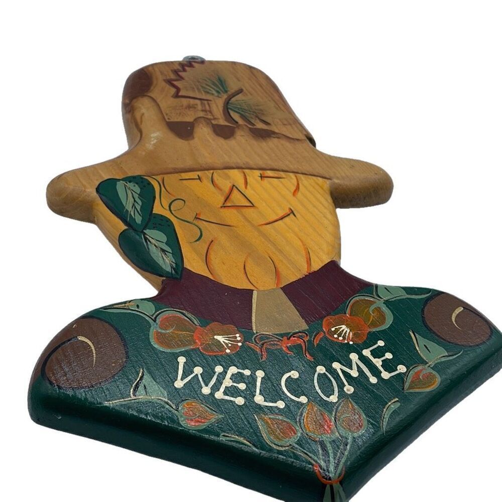 Vintage handmade hand painted in Mexico scarecrow wall art.